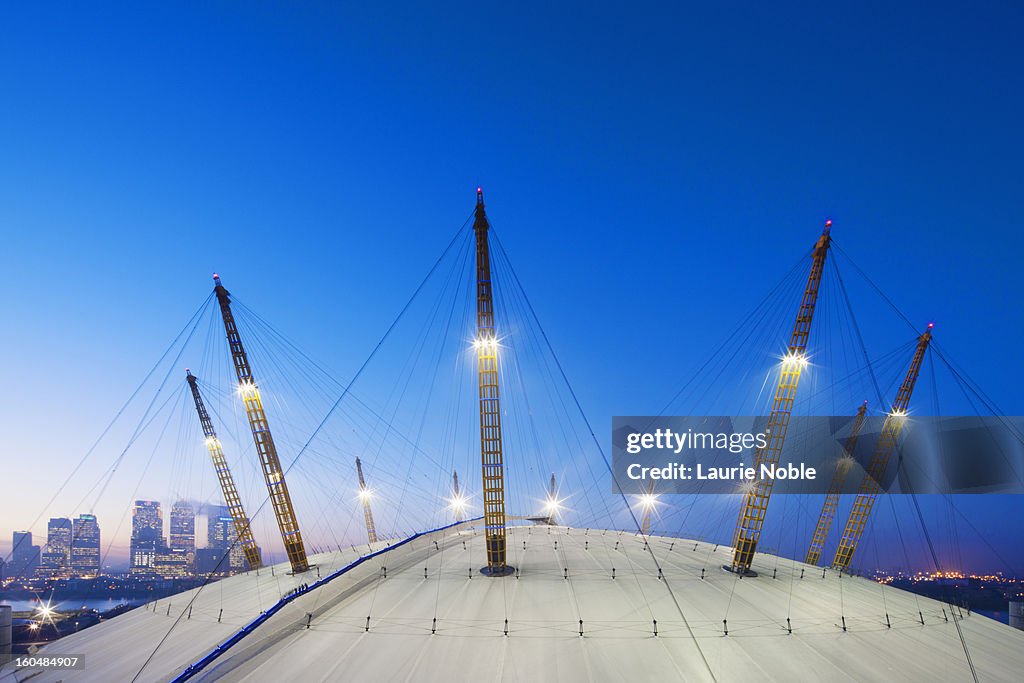 O2 Arena and Canary Wharf illuminated at dusk