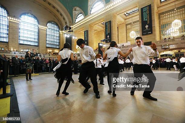 Young ballroom dancers from Dancing Classrooms dance in Grand Central Terminal during centennial celebrations on the day the famed Manhattan transit...