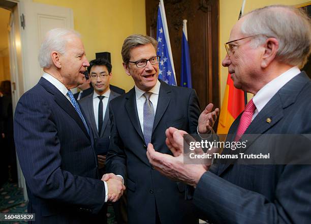 From left to right: U.S. Vice President Joe Biden, German Economy Minister and Vice Chancellor Philipp Roesler, German Foreign Minister Guido...