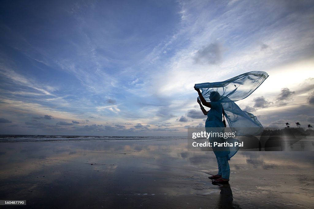 Woman enjoying breeze,seabeach,Mandarmani