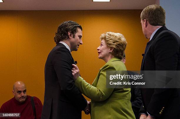 Actor Bradley Cooper and Senator Debbie Stabenow speak during the "Silver Lining Playbook" mental health progress press conference at Center For...