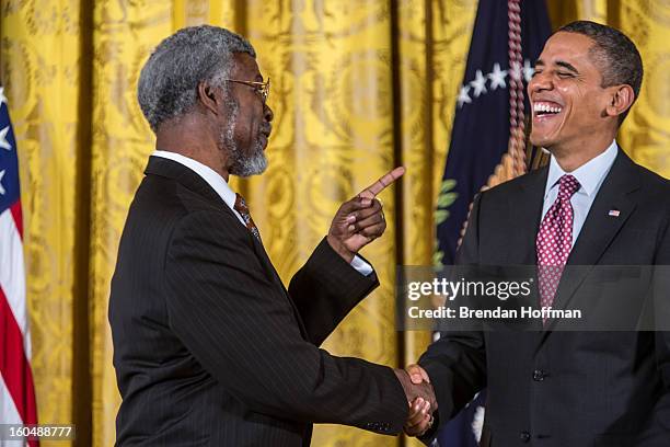 President Barack Obama awards the National Medal of Science to Sylvester James Gates, Jr. In a ceremony at the White House on February 1, 2013 in...