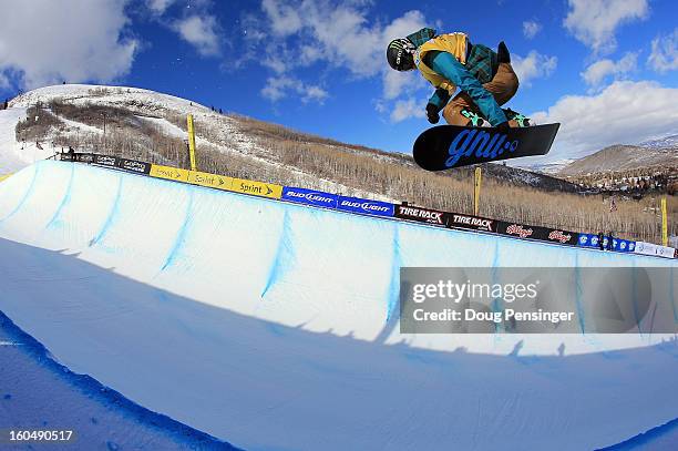 Kaitlyn Farrington spins above the pipe en route to a second place finish in the FIS Snowboard Halfpipe World Cup at the Sprint U.S. Grand Prix at...