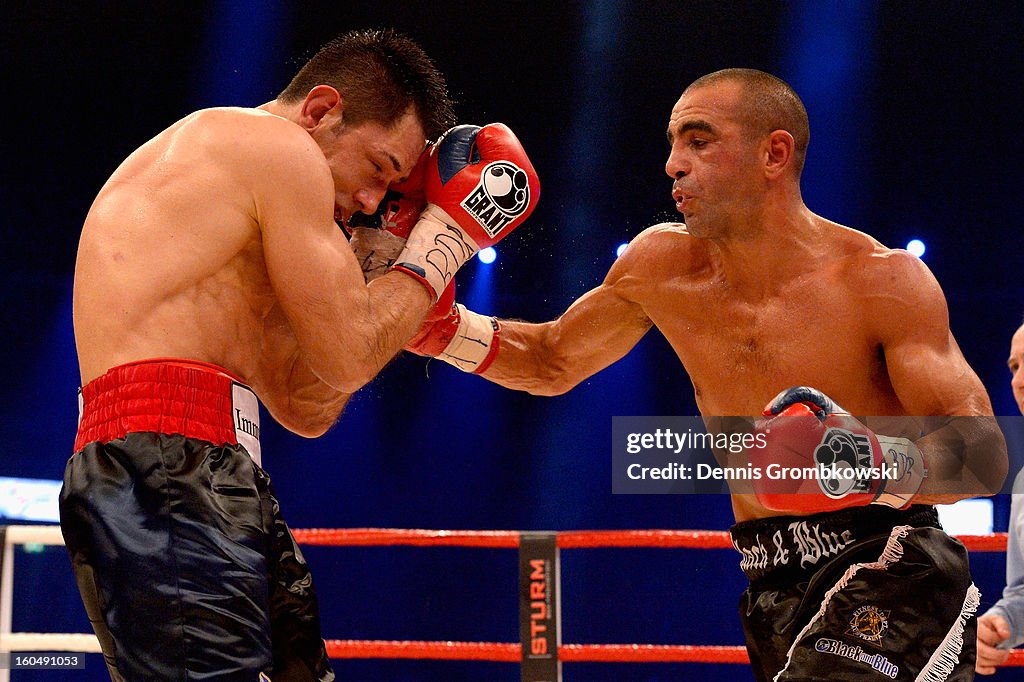 Felix Sturm of Germany and Sam Soliman of Australia box during their ...