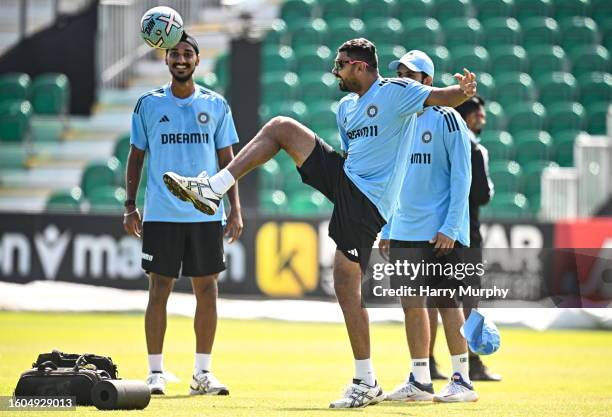 Dublin , Ireland - 17 August 2023; Avesh Khan, right, and Arshdeep Singh during a India Cricket squad training session at Malahide Cricket Club in...