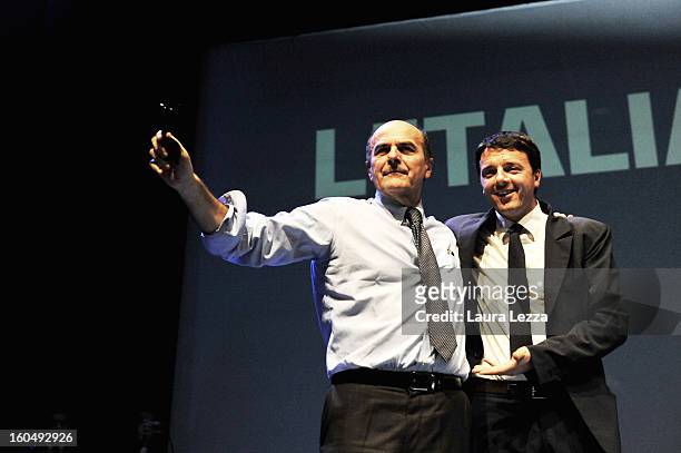 Florence Mayor Matteo Renzi appears onstage with Democratic Party candidate for prime minister Pierluigi Bersani at a political rally on February 1,...