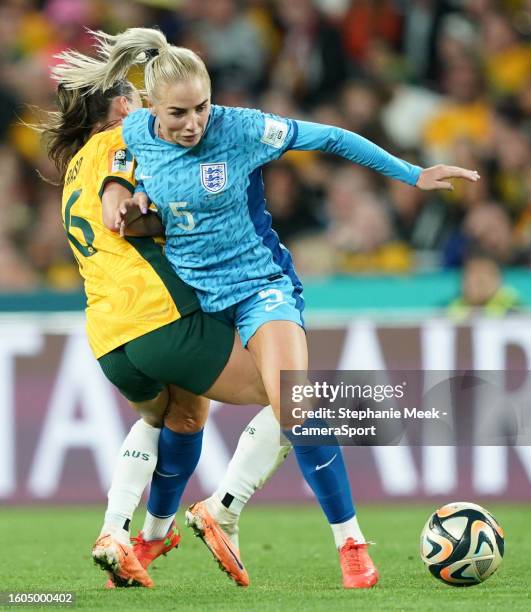 England's Alex Greenwood is tackled by Australia's Hayley Raso during the FIFA Women's World Cup Australia & New Zealand 2023 Semi Final match...