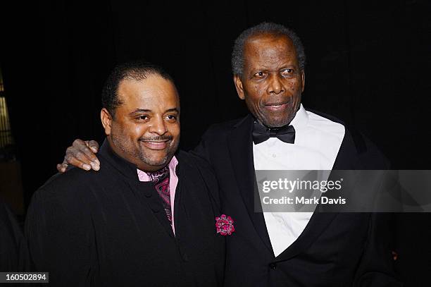 Journalist Roland Martin and actor Sidney Poitier attend the 44th NAACP Image Awards at The Shrine Auditorium on February 1, 2013 in Los Angeles,...