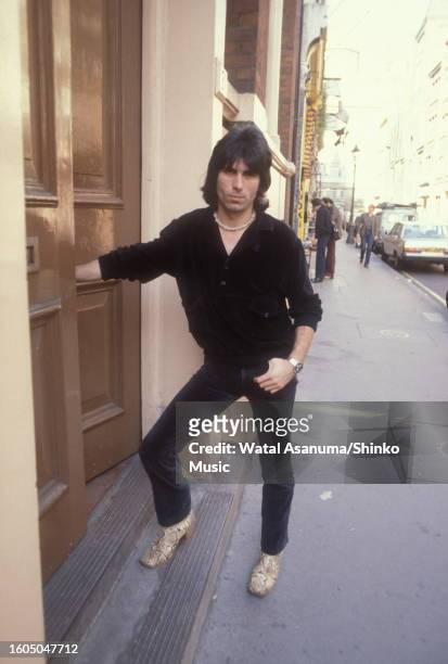 Portrait of English Rock musician Cozy Powell as he poses near Central Studios during the recording his first solo album, London, England, 13th April...