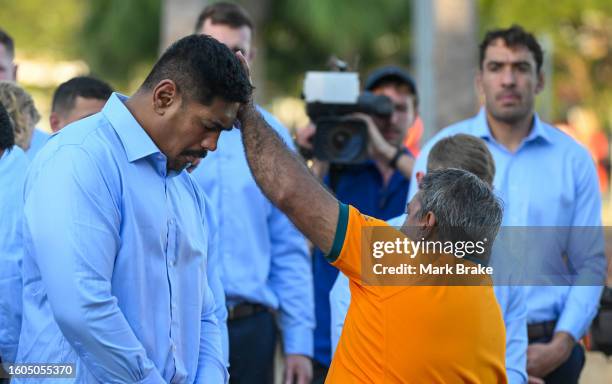 Local elder Richard Fejo performs the Saltwater ceremony from the Larrakia Nation to Wallabies player Will Skelton during the Australia Wallabies...