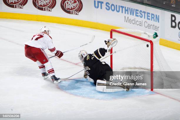 Radim Vrbata of the Phoenix Coyotes goes in for the shoot out goal against Kari Lehtonen of the Dallas Stars at the American Airlines Center on...