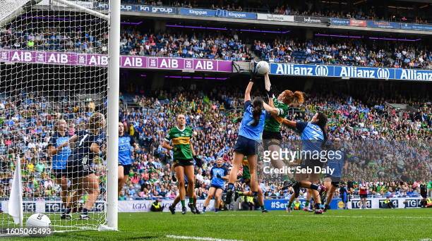 Dublin , Ireland - 13 August 2023; Louise Ní Mhuircheartaigh of Kerry scores her side's first goal, under pressure from Dublin's Niamh Donlon, left,...