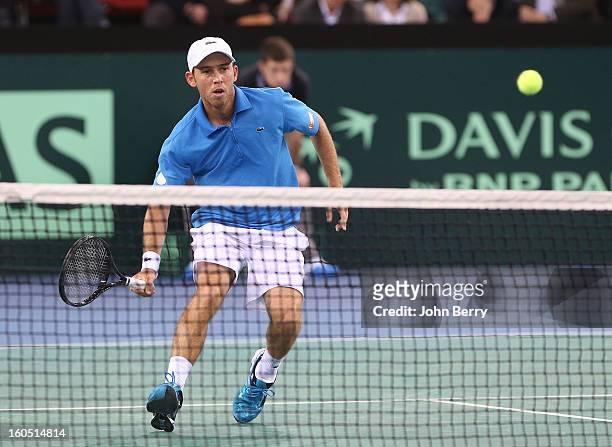 Dudi Sela of Israel plays a volley against Richard Gasquet of France on day one of the Davis Cup first round match between France and Israel at the...