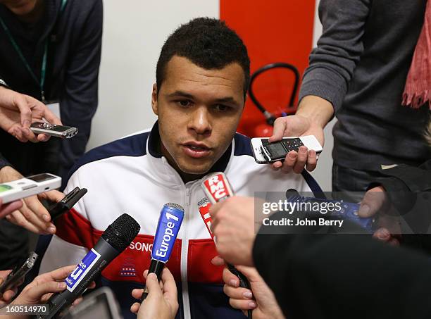 Jo-Wilfried Tsonga of France answers questions from the press on day one of the Davis Cup first round match between France and Israel at the...