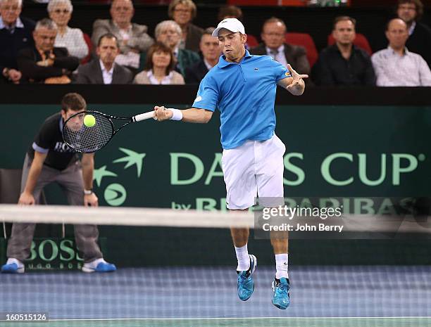 Dudi Sela of Israel plays a forehand against Richard Gasquet of France on day one of the Davis Cup first round match between France and Israel at the...