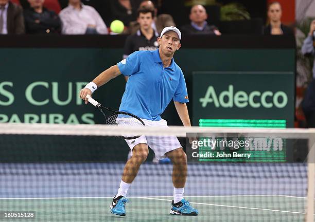 Dudi Sela of Israel plays a backhand against Richard Gasquet of France on day one of the Davis Cup first round match between France and Israel at the...