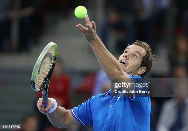 Richard Gasquet of France serves during his match against Dudi Sela of Israel on day one of the Davis Cup first round match between France and Israel...