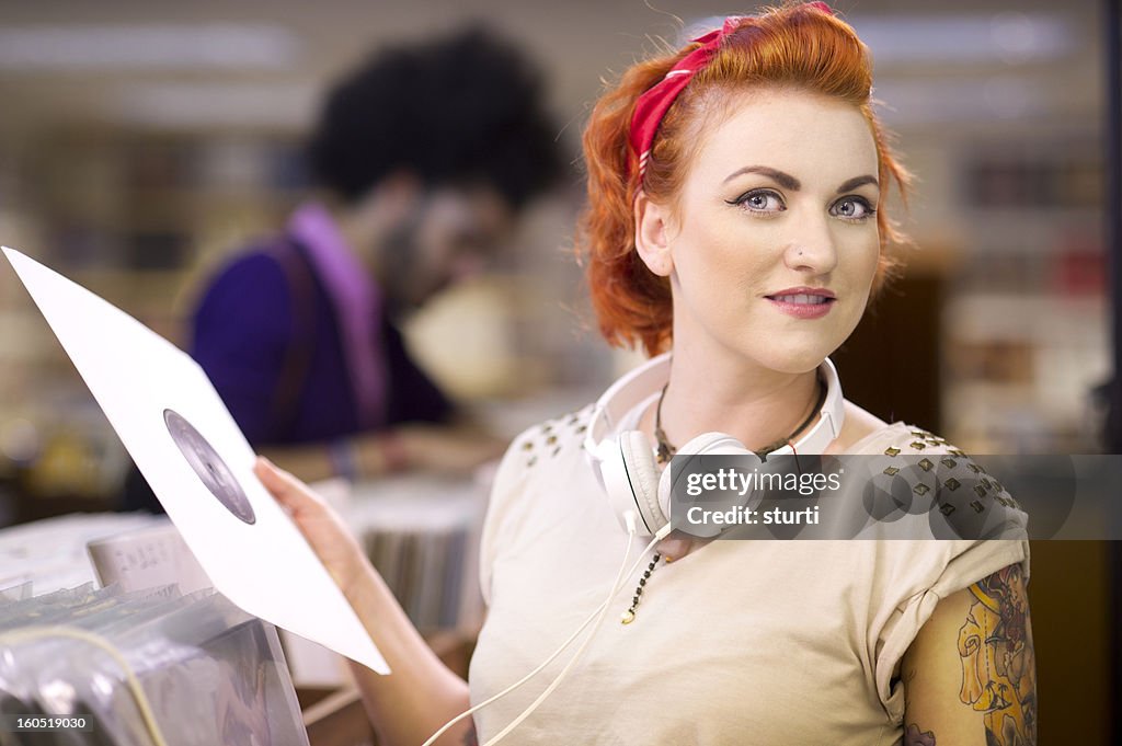 Young woman in a record shop