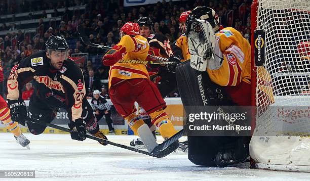 Ivan Ciernik of Hannover fails to score over Felix Bick , goaltender of Duesseldorf during the DEL match between Hannover Scorpions and Duesseldorfer...