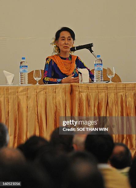 Myanmar opposition icon Aung San Suu Kyi speaks to attendees at the Irrawaddy Literary festival press conference at Inya Lake hotel in Yangon on...