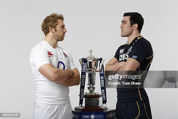 England Captain Chris Robshaw and Scotland Captain Kelly Brown pose with the Six Nations trophy during the RBS Six Nations launch at The Hurlingham...