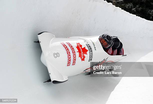 Lyndon Rush, Jesse Lumsden, Lascelles Brown and Neville Wright of Canada compete during the Four Men Bobsleigh heat one of the IBSF Bob & Skeleton...