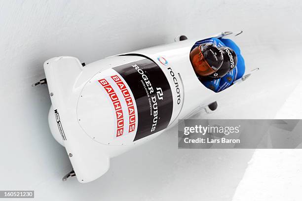 Alexander Kasjanov, Petr Moissev, Maxim Belugin and Kirill Antukh of Russia compete during the Four Men Bobsleigh heat one of the IBSF Bob & Skeleton...