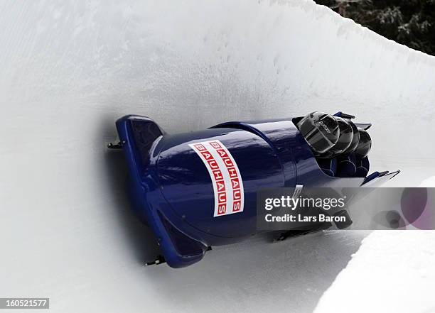 Lamin Deen, David Coleman, Ben Simons and Andrew Matthews of Great Britain compete during the Four Men Bobsleigh heat one of the IBSF Bob & Skeleton...