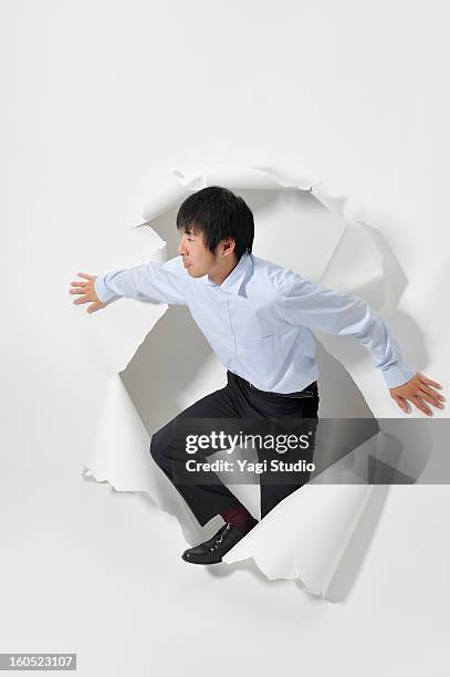 man out of the hole - appearance stock pictures, royalty-free photos & images