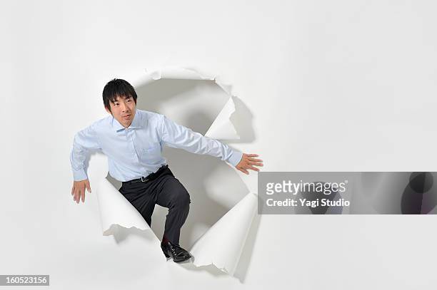 man out of the hole - break through stock pictures, royalty-free photos & images