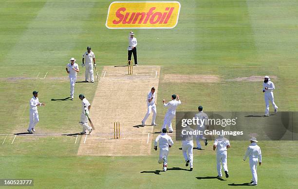 Dale Steyn of South Africa celebrates the wicket of Muhammad Hafeez of Pakistan for 6 runs during day 2 of the 1st Test match between South Africa...