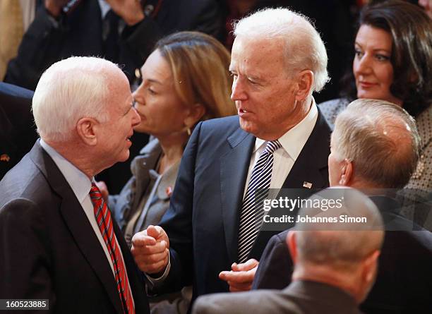 Vice President Joe Biden and U.S. Senator John McCain chat together during day 2 of the 49th Munich Security Conference at Hotel Bayerischer Hof on...