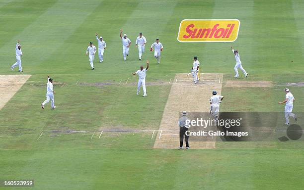 Vernon Philander of South Africa claims the wicket of Asad Shafiq of Pakistan for 1 run during day 2 of the 1st Test match between South Africa and...