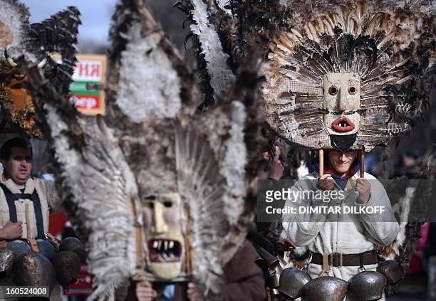 Bulgarian dancers known as "kukeri" perform a ritual dance during the International Festival of the Masquerade Games in Pernik near the capital...