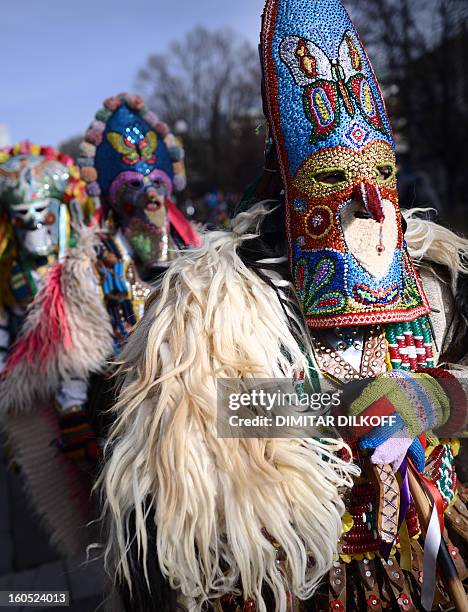 Dancers known as "kukeri" perform a ritual dance during the International Festival of the Masquerade Games in Pernik near the capital Sofia, on...