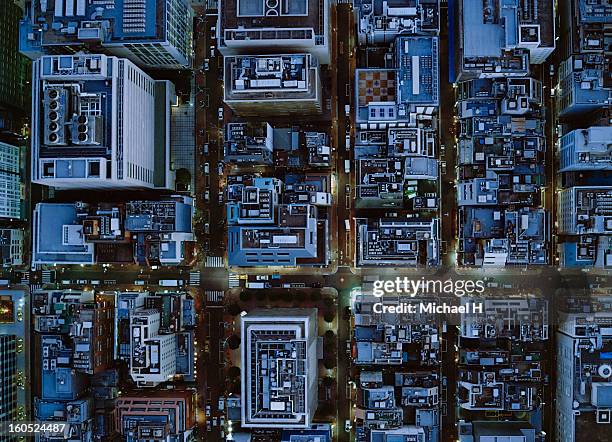 ariel view of ginza, tokyo at night. - electrical overload stockfoto's en -beelden