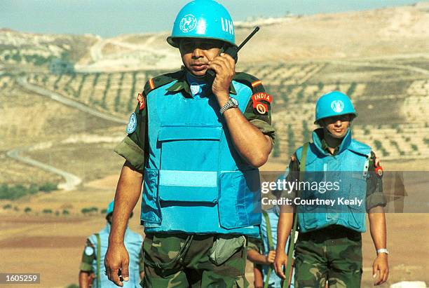 Soldiers from the Indian Battalian of the United Nations Peacekeeping Force of Lebanon patrol along the border with Israel and Syria in an effort to...