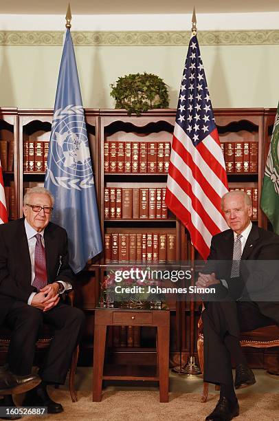 Lakhdar Brahimi , UN joint special representative, and U.S. Vice president Joe Biden pose ahead of a bilateral meeting at Hotel Bayerischer Hof on...