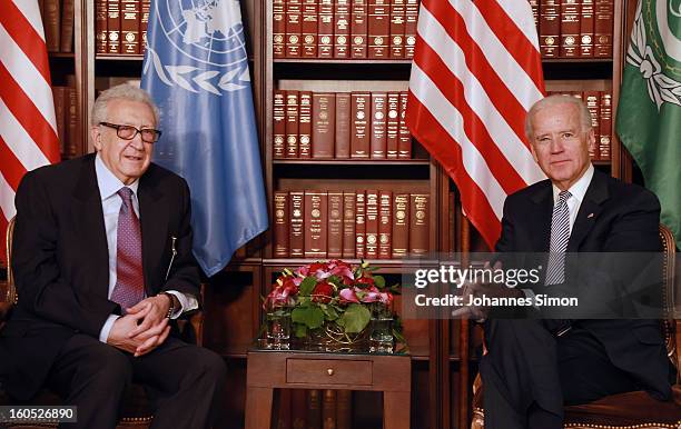 Lakhdar Brahimi , UN joint special representative, and U.S. Vice president Joe Biden pose ahead of a bilateral meeting at Hotel Bayerischer Hof on...
