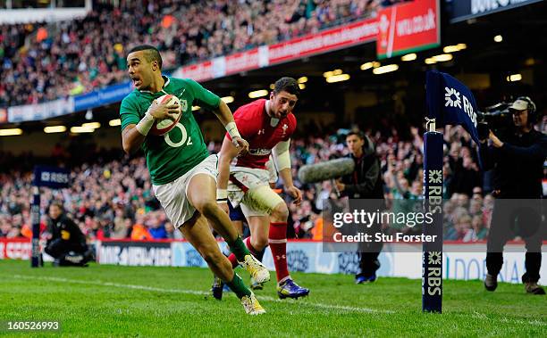 Ireland wing Simon Zebo runs in the first try during the RBS Six Nations game between Wales and Ireland at the Millennium Stadium in Cardiff, Wales.