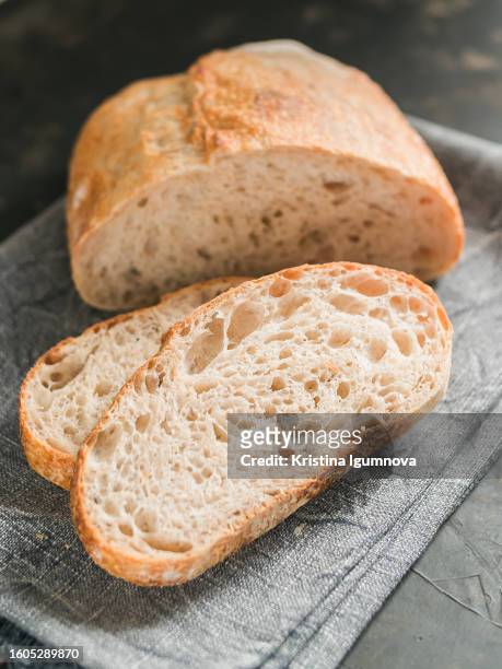 https://media.gettyimages.com/id/1605289870/photo/fresh-sliced-wheat-bread-texture-of-baked-porous-bread.jpg?s=612x612&w=gi&k=20&c=YjSHT80NUmqevDAw2HvZZ0QdSrkuF0kBufDTxiraArg=