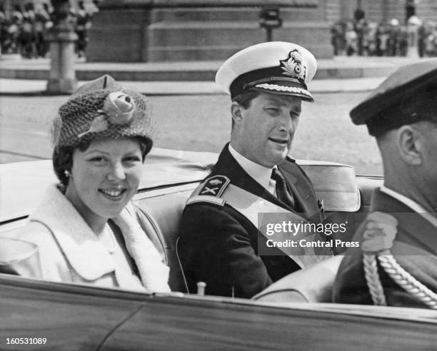 Princess Beatrix of the Netherlands on her way to the Royal Palace of Brussels with Prince Albert of Belgium after her arrival in the city during a...