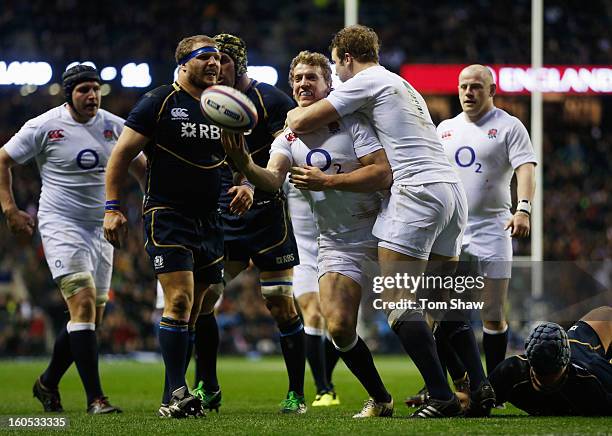 Billy Twelvetrees of England celebrates his try during the RBS Six Nations match between England and Scotland at Twickenham Stadium on February 2,...