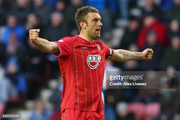Rickie Lambert of Southampton celebrates after scoring his goal during the Barclays Premier League match between Wigan Athletic and Southampton at DW...