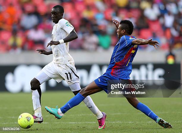 Soares Luis of Cape Verde tries to tackle Mohammed Rabiu Alhassan of Gana in action during the 2013 Africa Cup of Nations Quarter-Final match between...