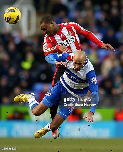 Danny Rose of Sunderland in action with Jimmy Kebe of Reading during the Barclays Premier League match between Reading and Sunderland at Madejski...