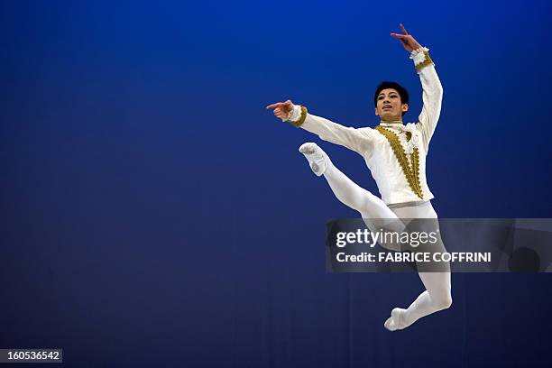 Wentao Li of China, from the Secondary Dance School attached to Beijing Dance Academy, performs during classical selections of the 41st International...