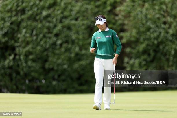 Jeongeun Lee6 of South Korea celebrates a birdie putt on the 18th green on Day One of the AIG Women's Open at Walton Heath Golf Club on August 10,...