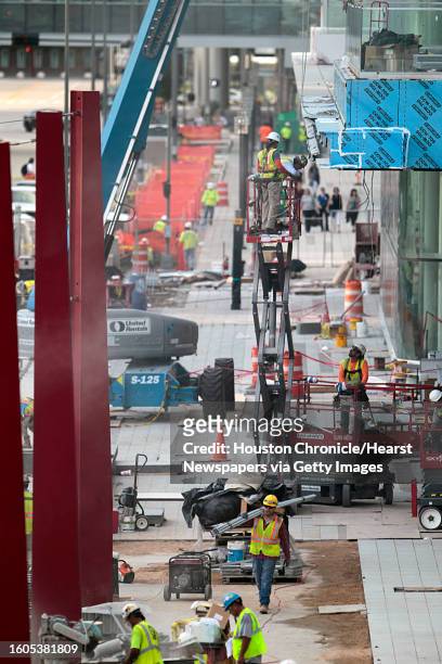 Construction work continues outside the George R. Brown Convention Center to meet the Super Bowl deadline Oct. 19 in Houston.