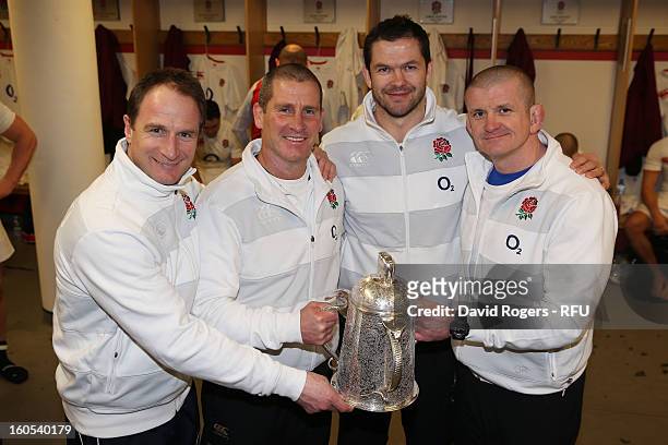England head coach Stuart Lancaster holds the Calcutta Cup with fellow coaches Mike Catt , Andy Farrell and Graham Rowntree during the RBS Six...